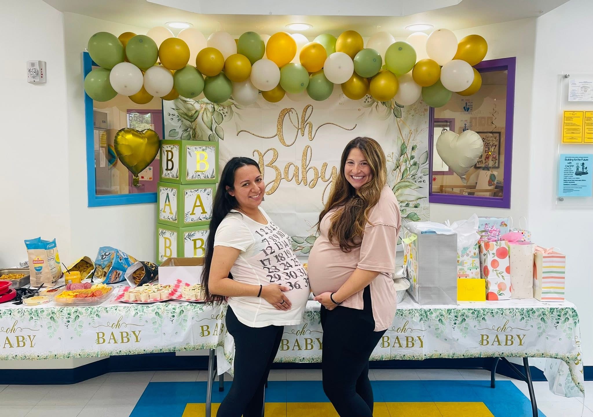 Two expectant educators at the SBA baby shower