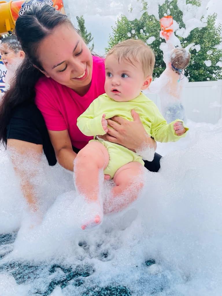 Teacher and baby at Smart Beginnings Academy