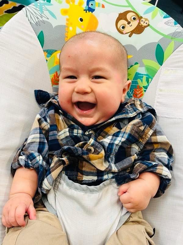 Happy laughing baby at Smart Beginnings Academy